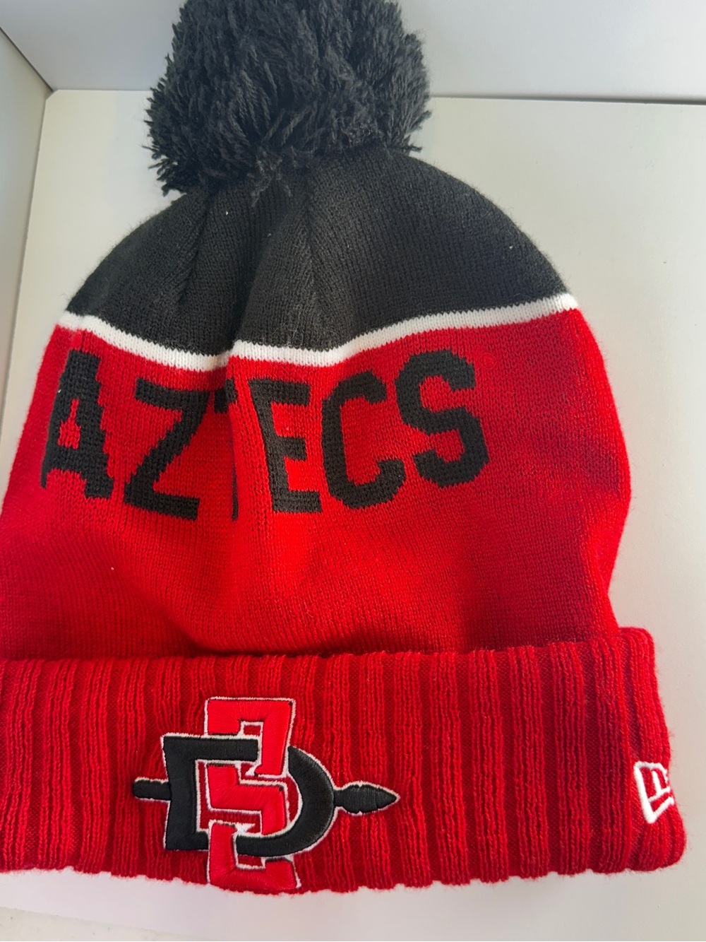 San Diego State University Aztecs Cozy Pom Beanie Black Red, lightly used clean